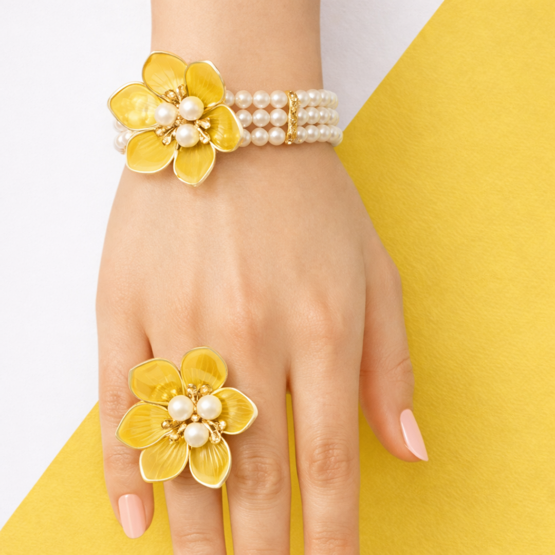Elegant yellow floral bracelet with pearls and gold accents